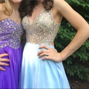 Elegant Gigi size three thigh length dress